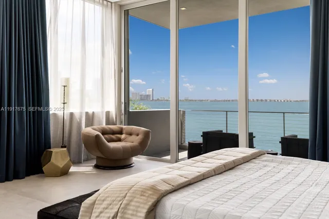 a bathroom with a bathtub and a sink