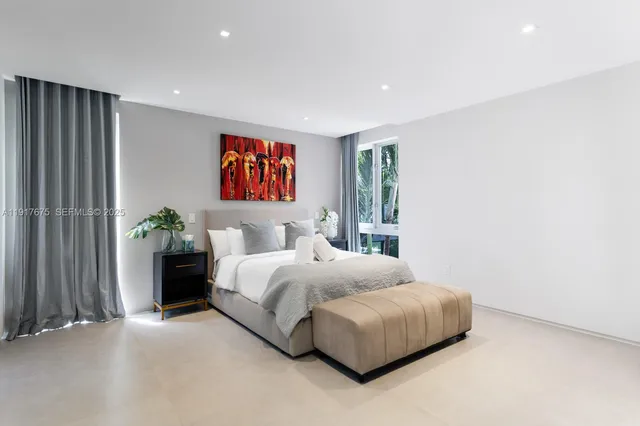 a view of a house with sitting area and swimming pool