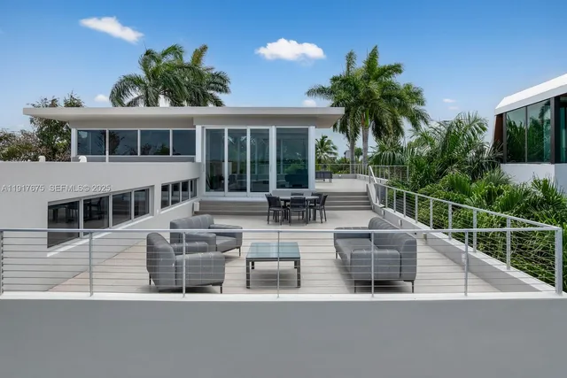 a close view of a sink and a refrigerator in a kitchen