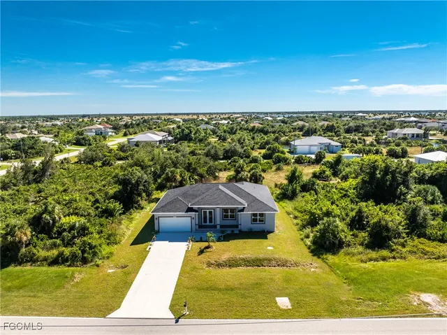 a view of a yard with an outdoor space