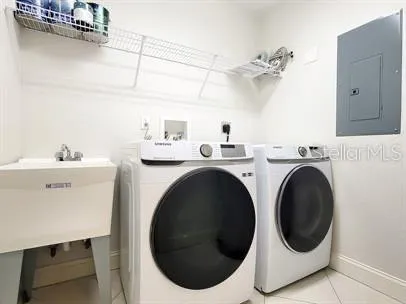 a view of a swimming pool with a patio