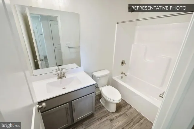 a bathroom with a shower and a bathtub