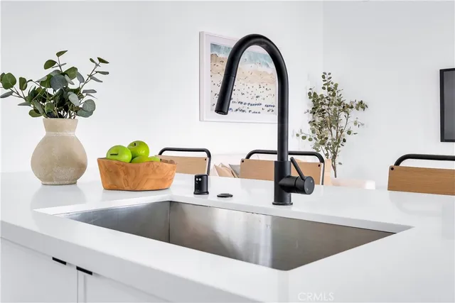 a view of a hallway with washer and dryer