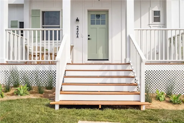 a view of entryway with a wooden door