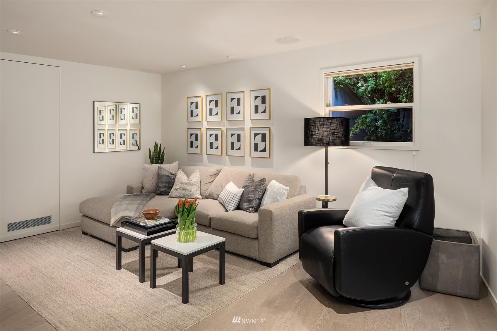 3022 Hunts Point Road Hunts Point, WA 98004 - Photo 16 of 37 a living room with furniture and a window