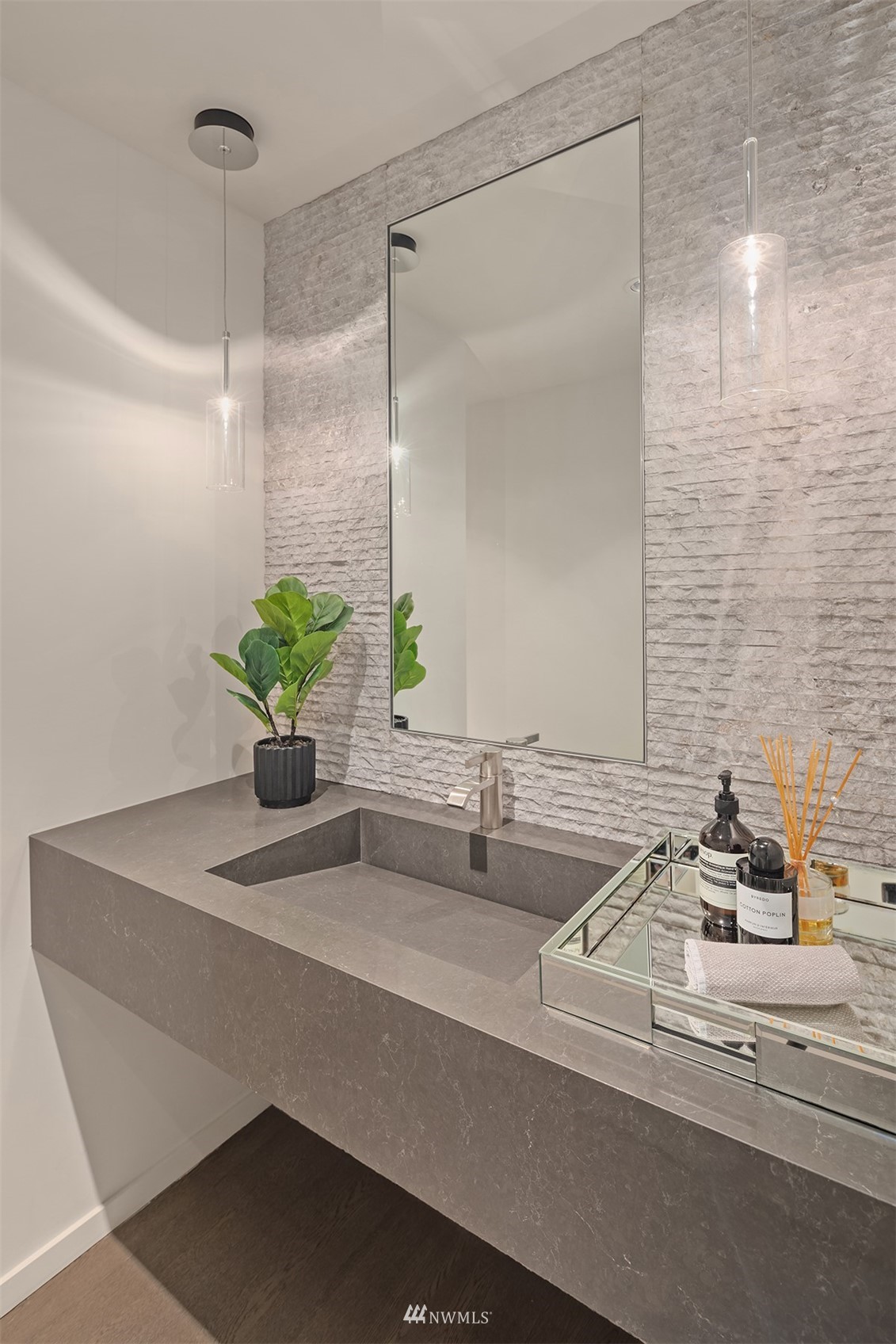 3022 Hunts Point Road Hunts Point, WA 98004 - Photo 17 of 37 a bathroom with a sink and a mirror