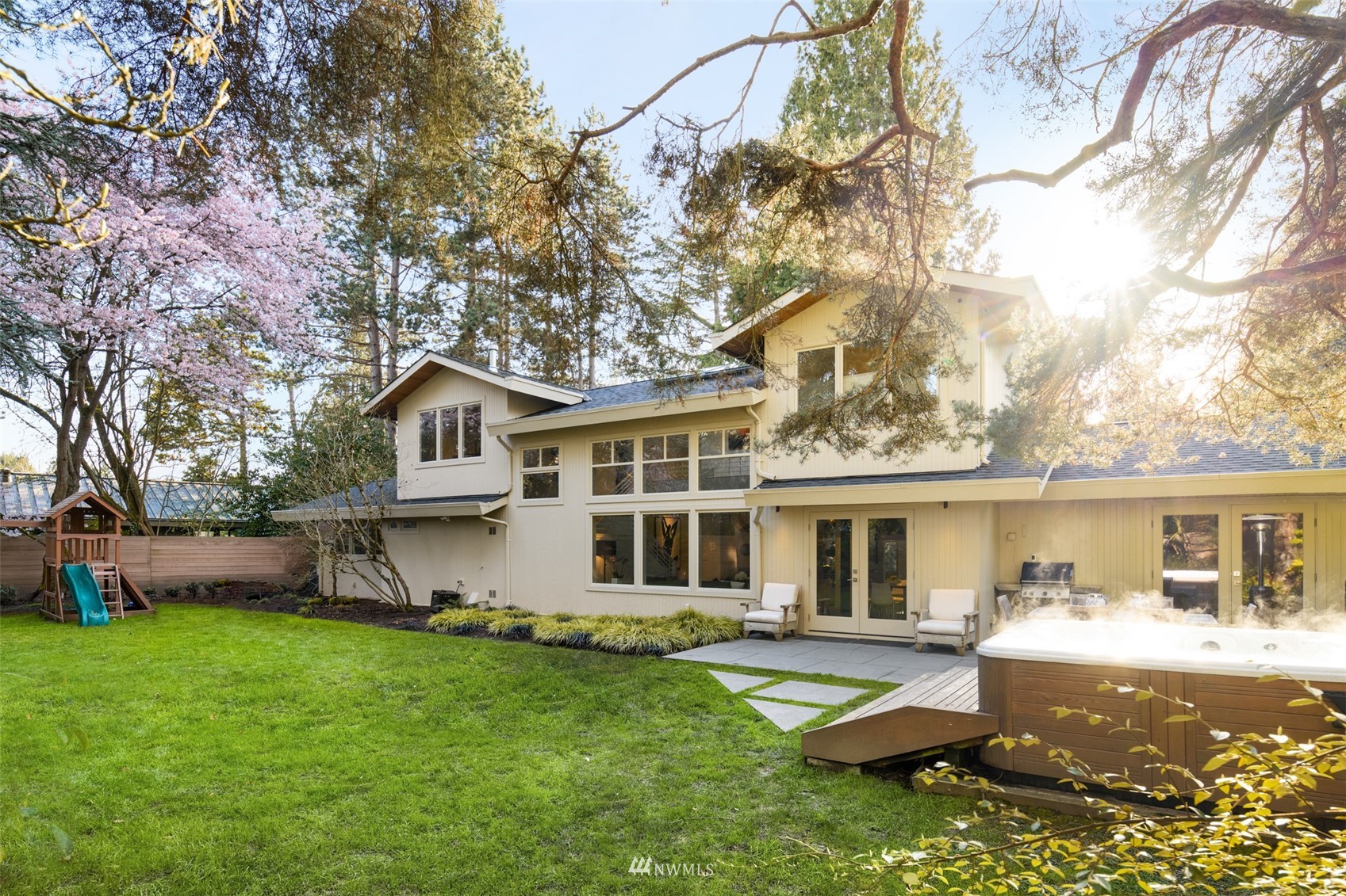 3022 Hunts Point Road Hunts Point, WA 98004 - Photo 2 of 37 front view of a house with a yard