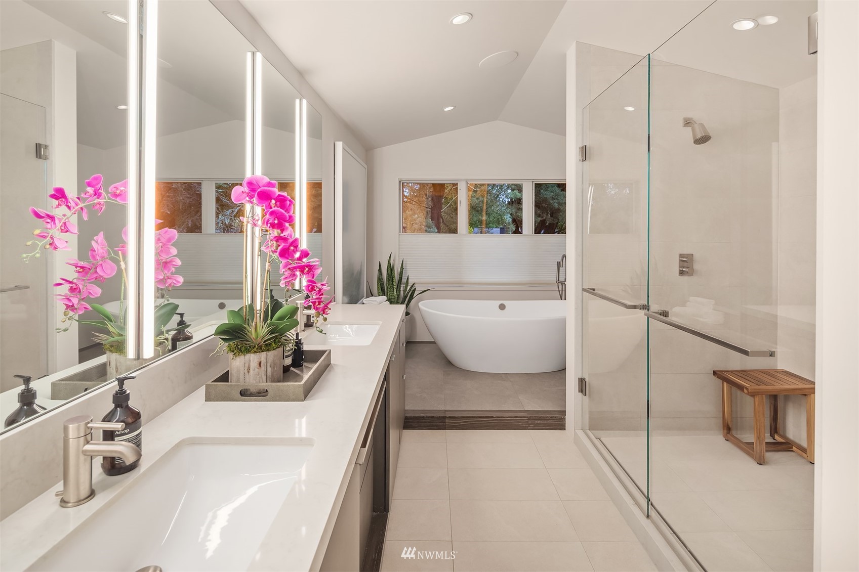 3022 Hunts Point Road Hunts Point, WA 98004 - Photo 25 of 37 a bathroom with a sink a vanity and a mirror