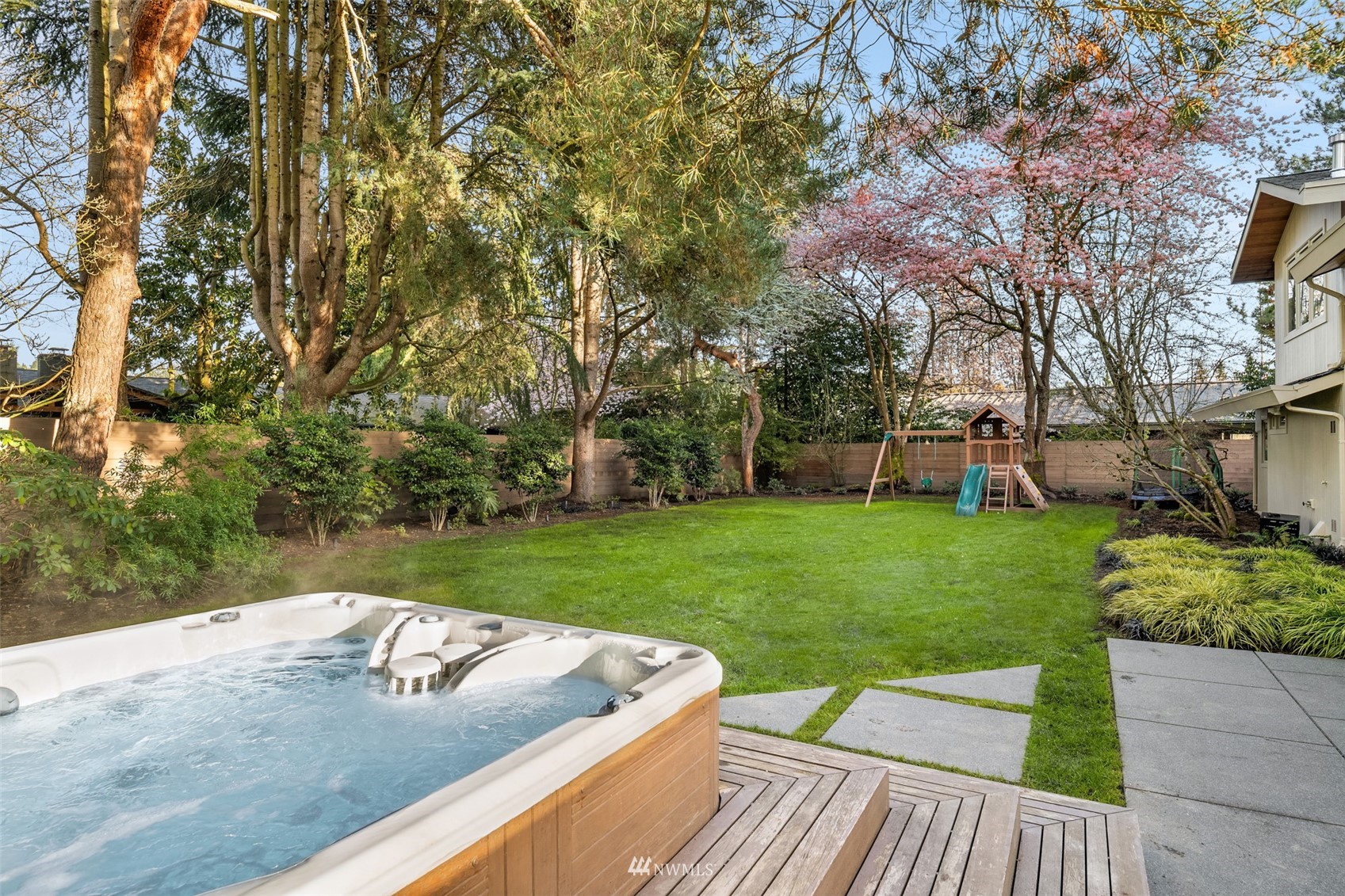 3022 Hunts Point Road Hunts Point, WA 98004 - Photo 30 of 37 a view of backyard with seating and green space