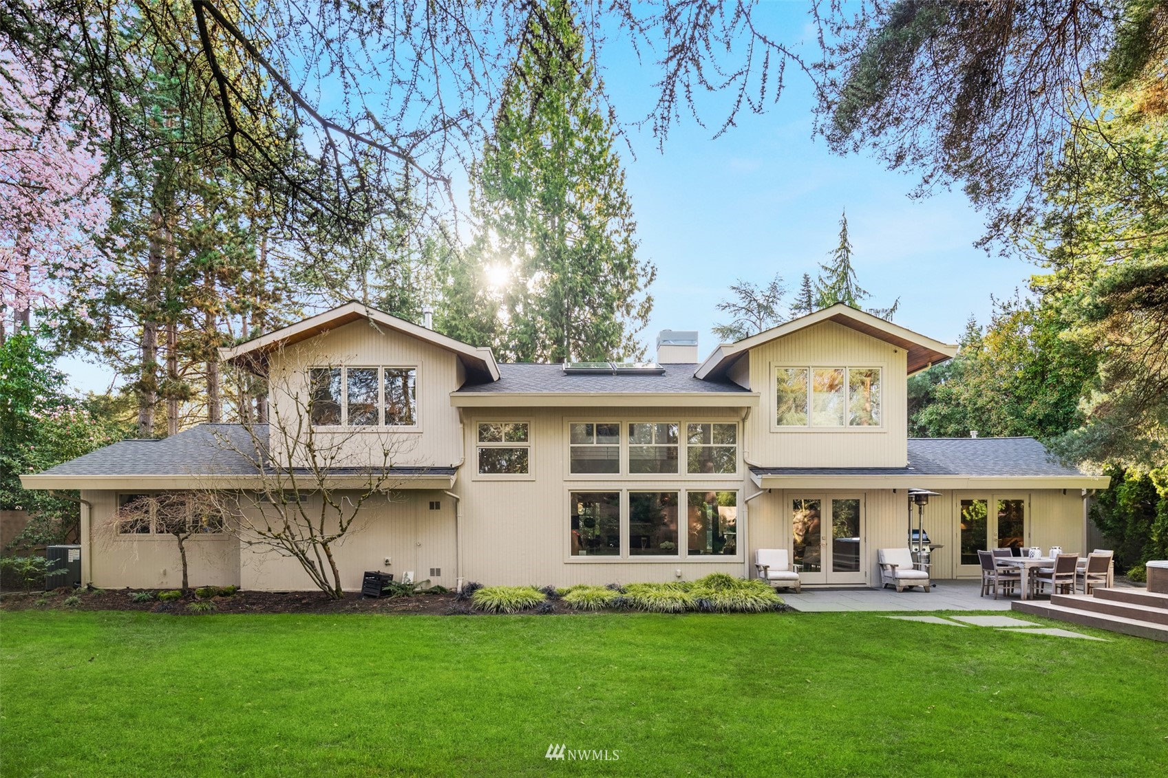 3022 Hunts Point Road Hunts Point, WA 98004 - Photo 32 of 37 a front view of a house with a yard