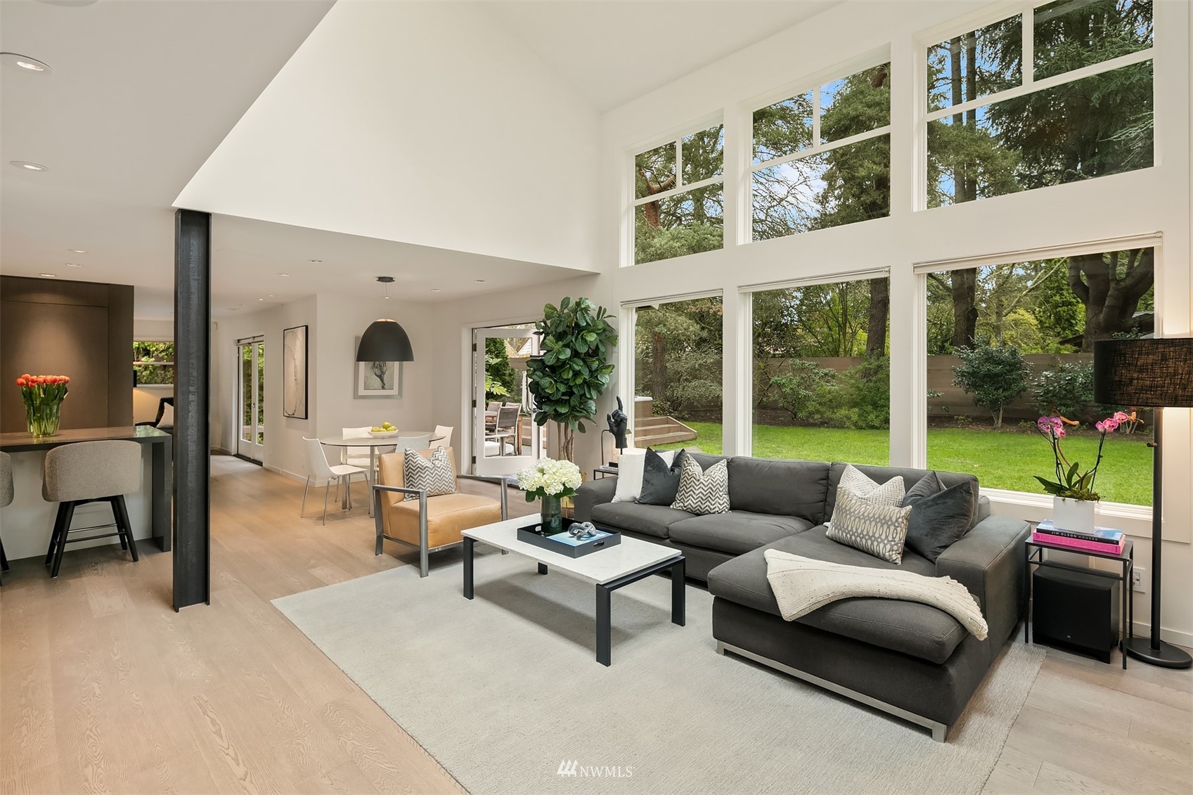 3022 Hunts Point Road Hunts Point, WA 98004 - Photo 8 of 37 a living room with furniture and a large window