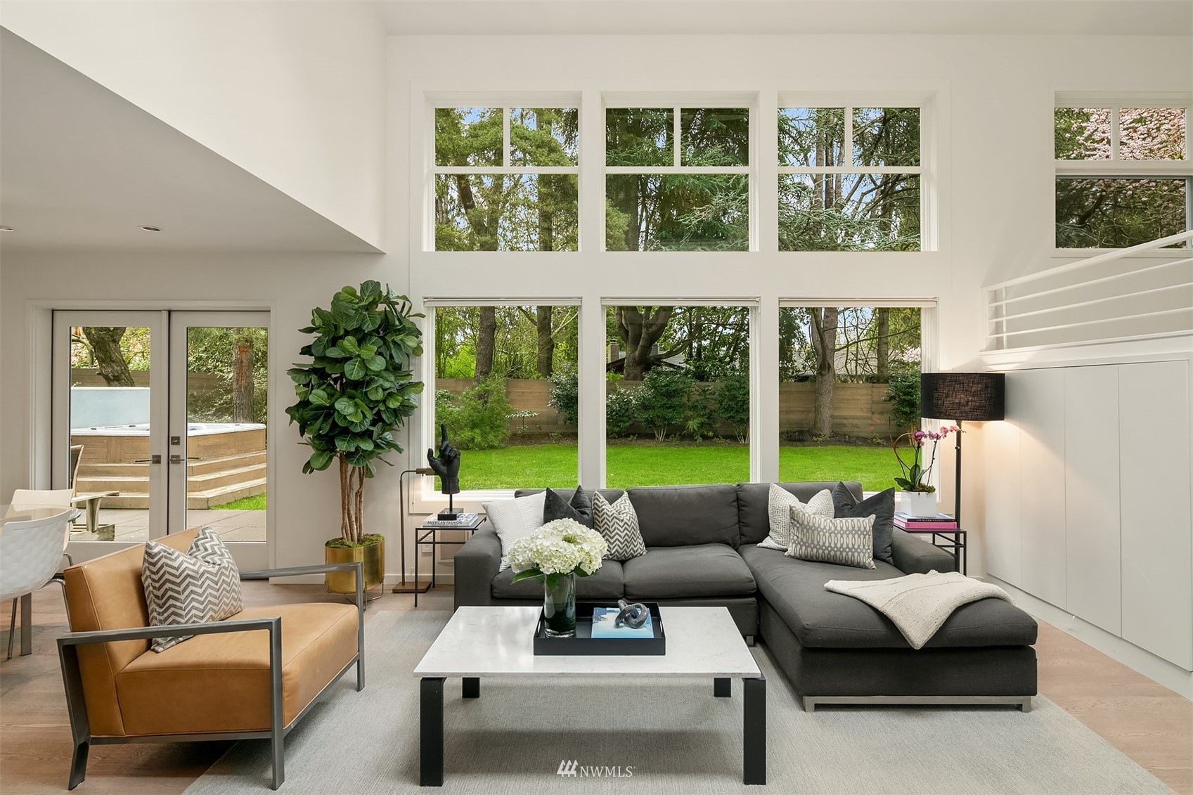 3022 Hunts Point Road Hunts Point, WA 98004 - Photo 10 of 37 a living room with furniture and a large window