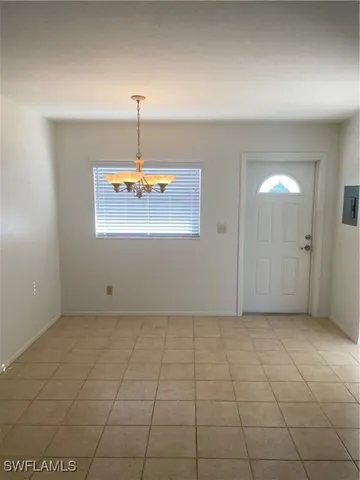 an empty room with a bathroom