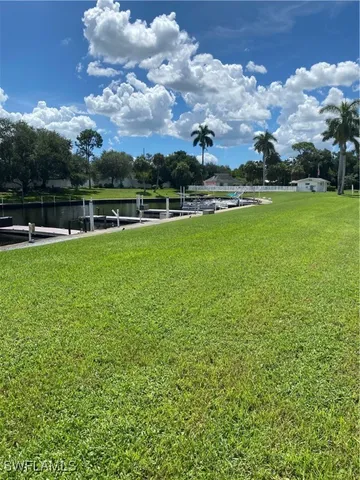 a view of a golf course with a lake