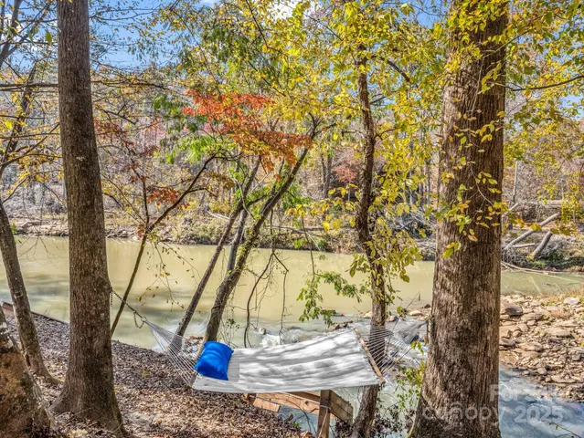 a view of a lake with a house