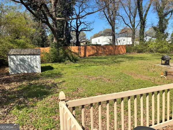 a view of deck and garden
