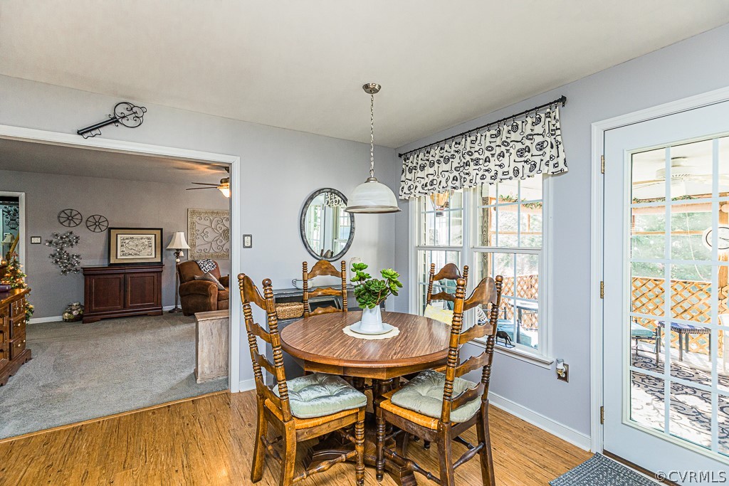 3620 Winterhaven Road Midlothian, VA 23112 - Photo 15 of 42 a view of a dining room with furniture window and wooden floor