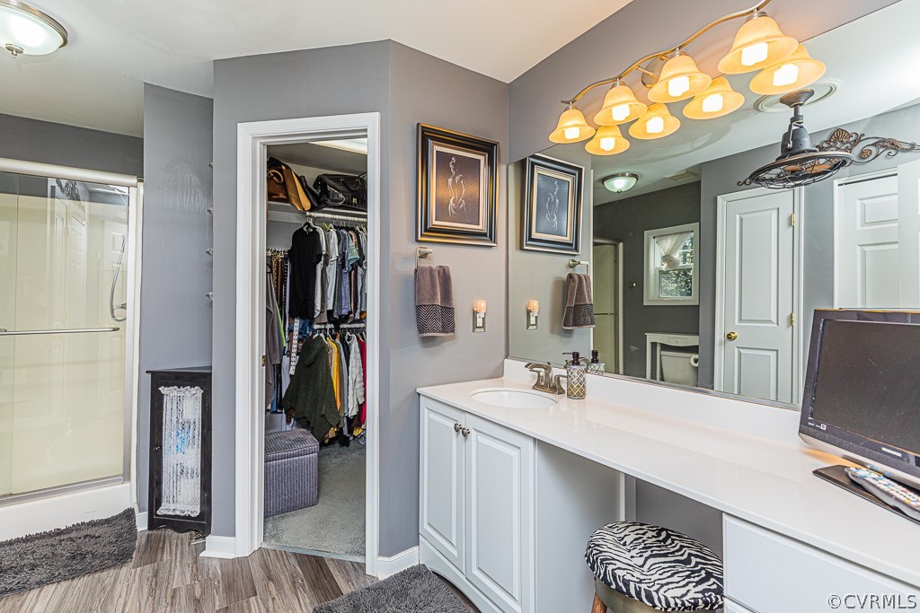 3620 Winterhaven Road Midlothian, VA 23112 - Photo 23 of 42 a bathroom with a sink a vanity and a mirror