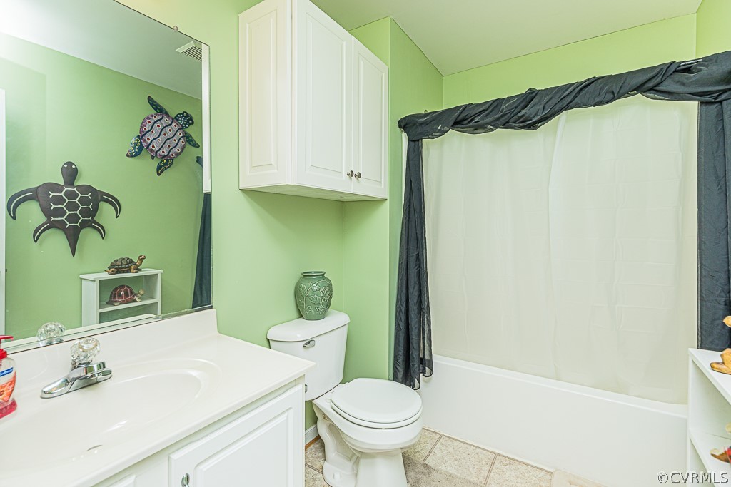 3620 Winterhaven Road Midlothian, VA 23112 - Photo 28 of 42 a white toilet sitting next to a bathroom sink and a shower