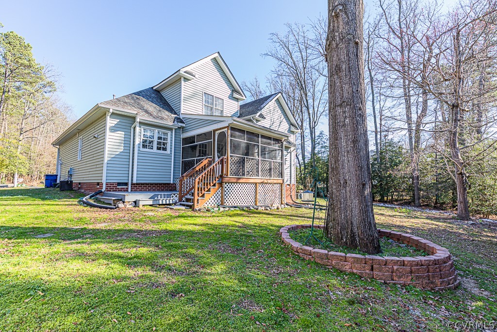 3620 Winterhaven Road Midlothian, VA 23112 - Photo 37 of 42 a front view of a house with a yard table and garage