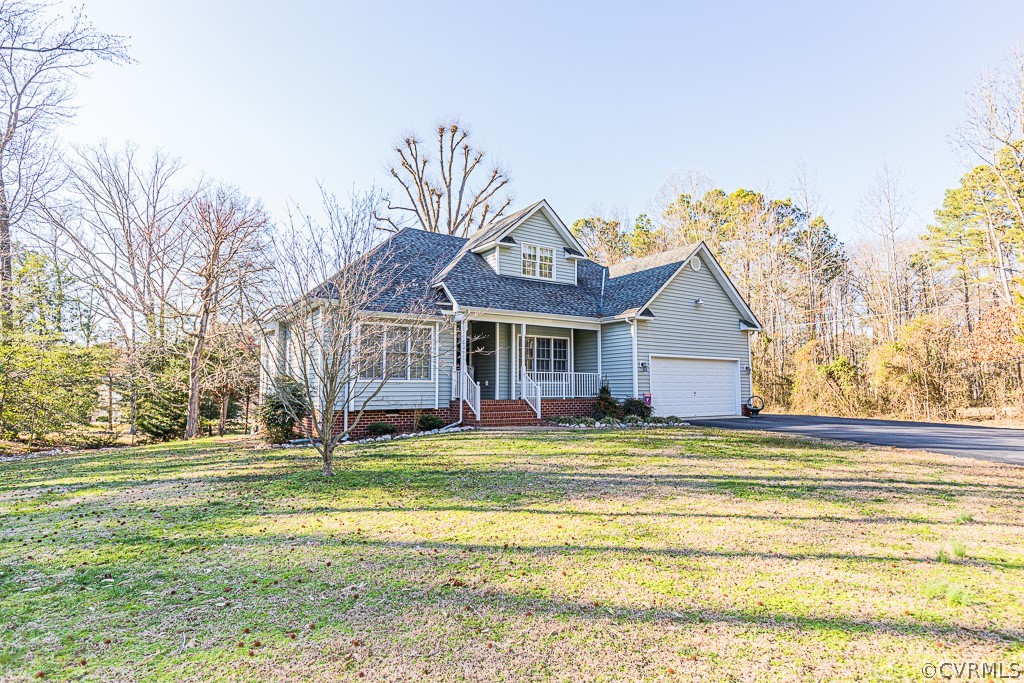 3620 Winterhaven Road Midlothian, VA 23112 - Photo 41 of 42 a view of a house with a big yard and palm trees