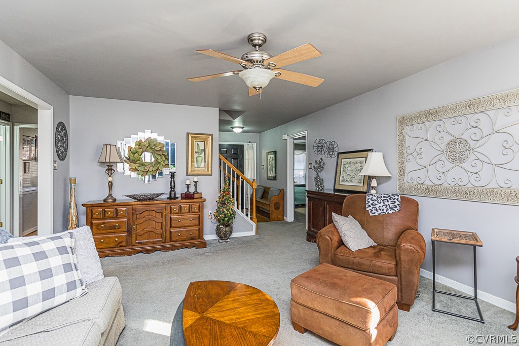 3620 Winterhaven Road Midlothian, VA 23112 - Photo 7 of 42 a living room with furniture and a chandelier