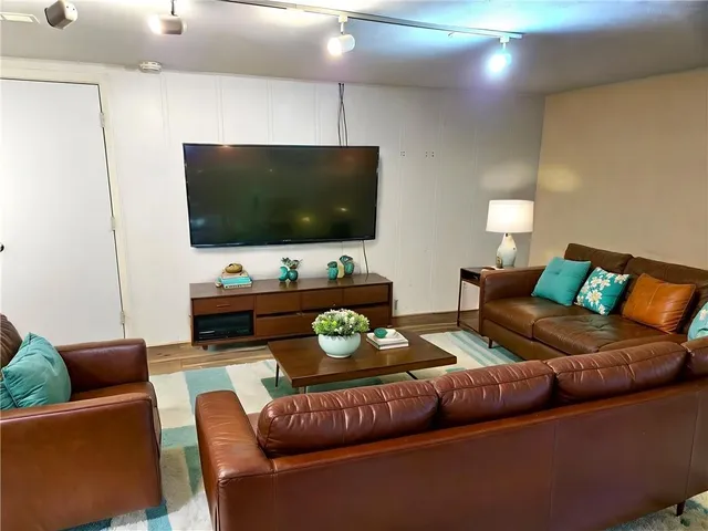 a view of a big yard with lots of green space