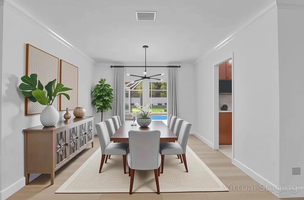 6769 Entrada Place Boca Raton, FL 33433 - Photo 11 of 47 a view of a dining room with furniture window and wooden floor