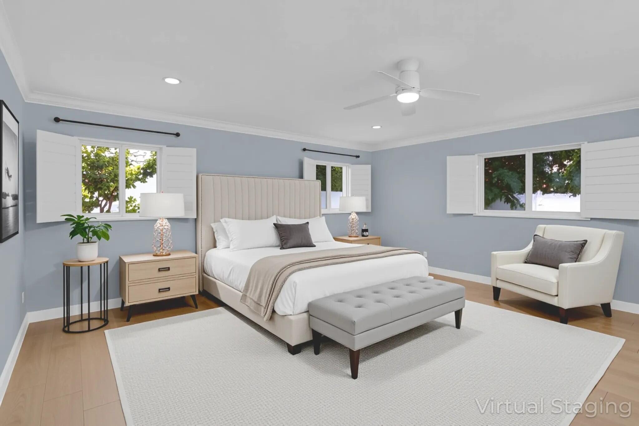 6769 Entrada Place Boca Raton, FL 33433 - Photo 13 of 47 a spacious bedroom with a bed and a couch