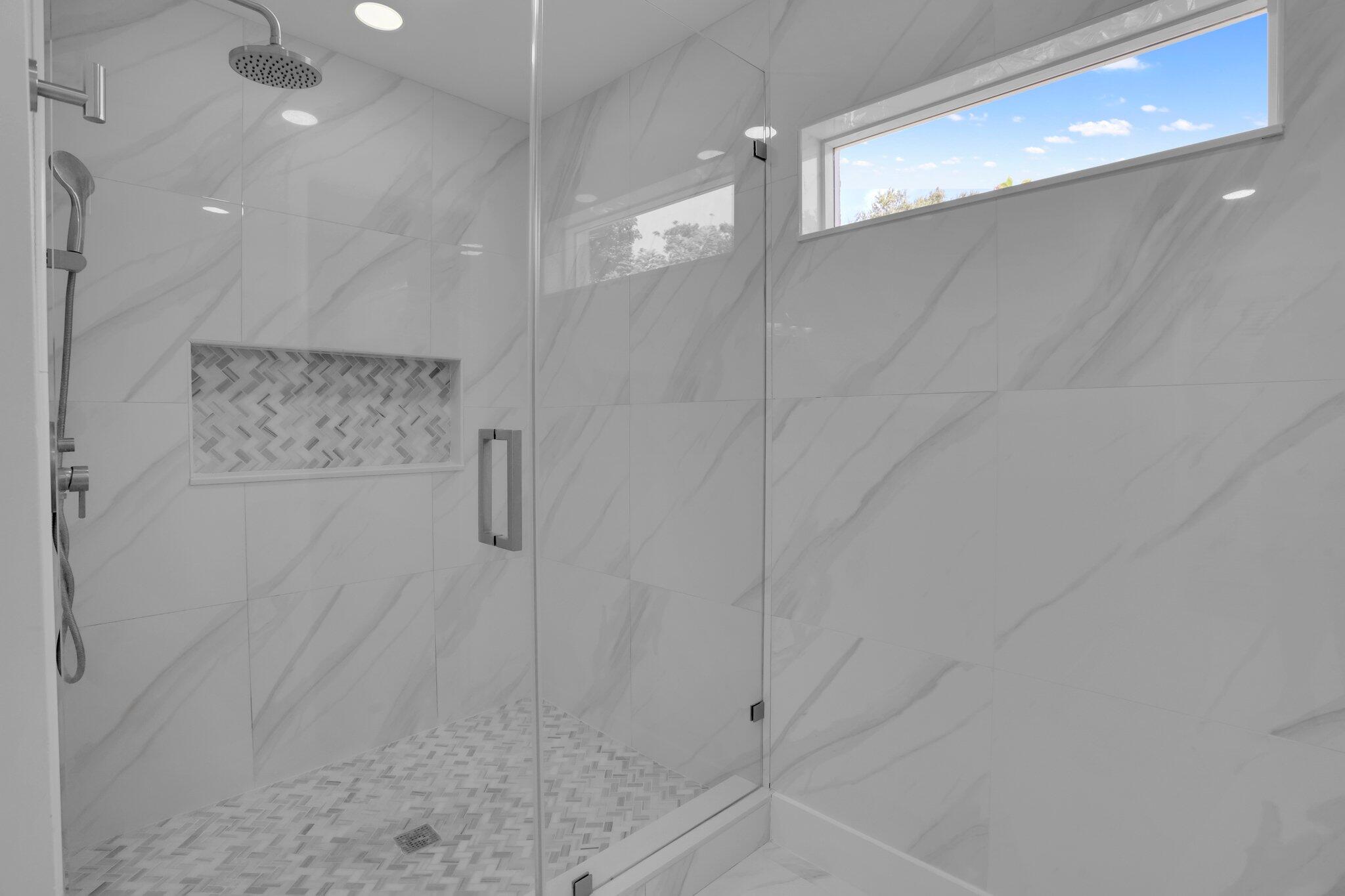 6769 Entrada Place Boca Raton, FL 33433 - Photo 17 of 47 a bathroom with a shower