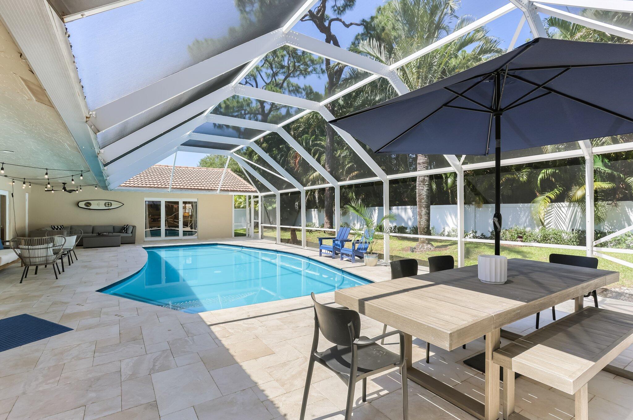 6769 Entrada Place Boca Raton, FL 33433 - Photo 33 of 47 an outdoor space with furniture and umbrella