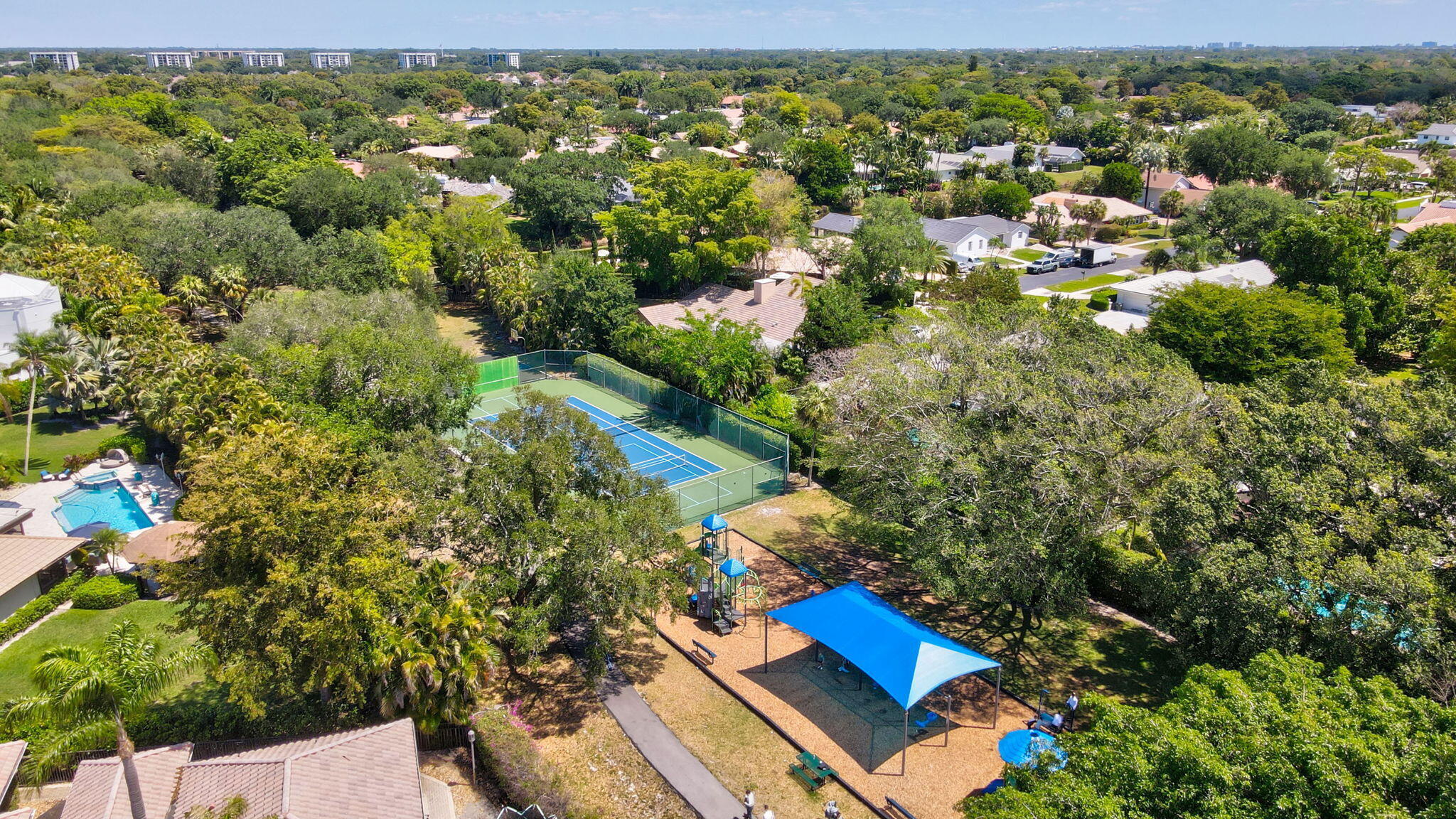6769 Entrada Place Boca Raton, FL 33433 - Photo 47 of 47 an aerial view of residential houses with outdoor space and trees