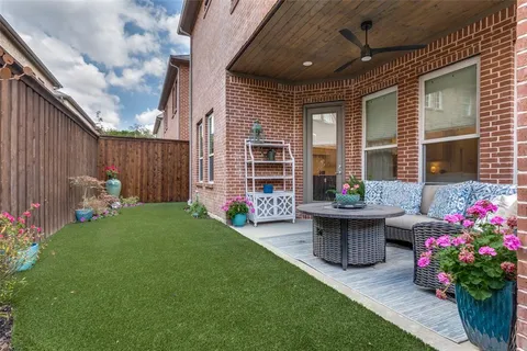 a garden view with a seating space