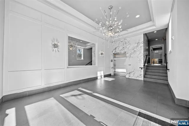 a view of a living room with a chandelier