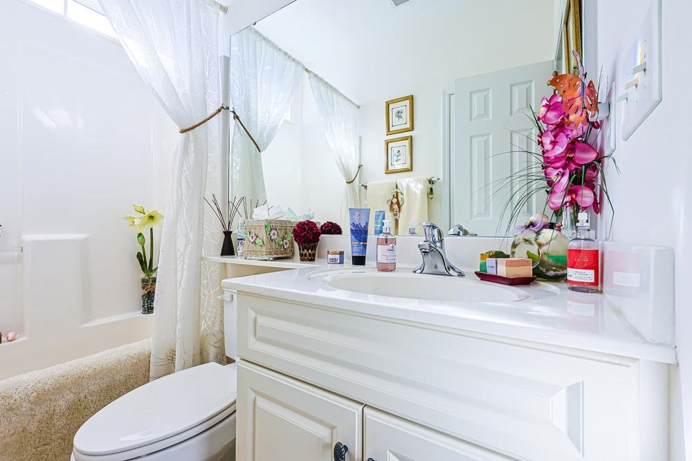 815 Botany Loop, Unit 815 Murrells Inlet, SC 29576 - Photo 33 of 40 Bathroom featuring vanity and shower / bath combination with curtain
