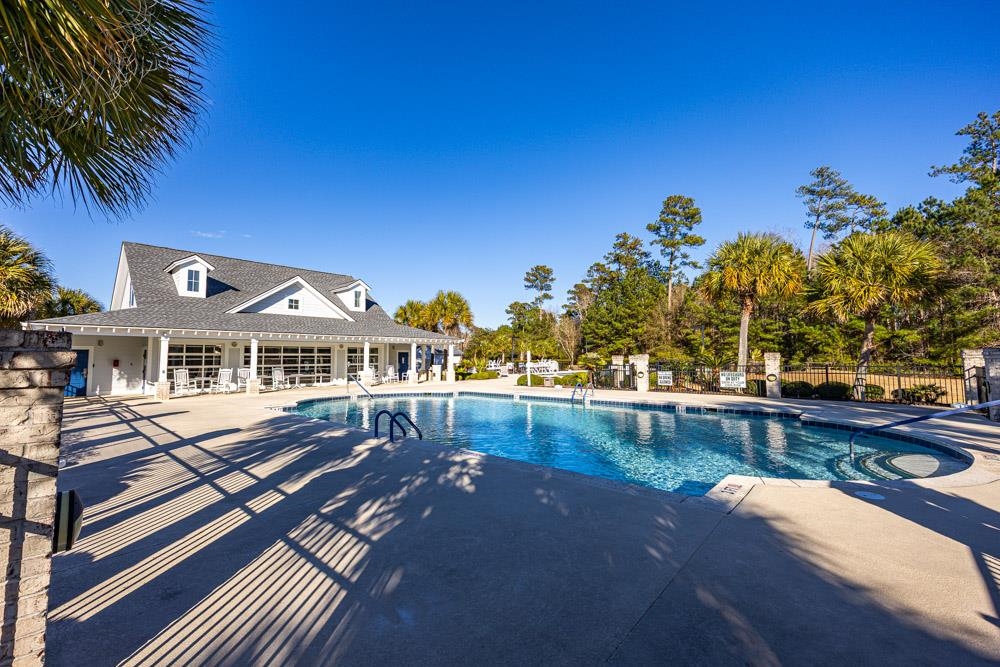 815 Botany Loop, Unit 815 Murrells Inlet, SC 29576 - Photo 35 of 40 Community pool featuring a patio area