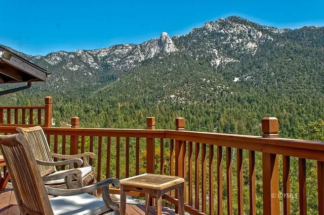 a view of a backyard of the house