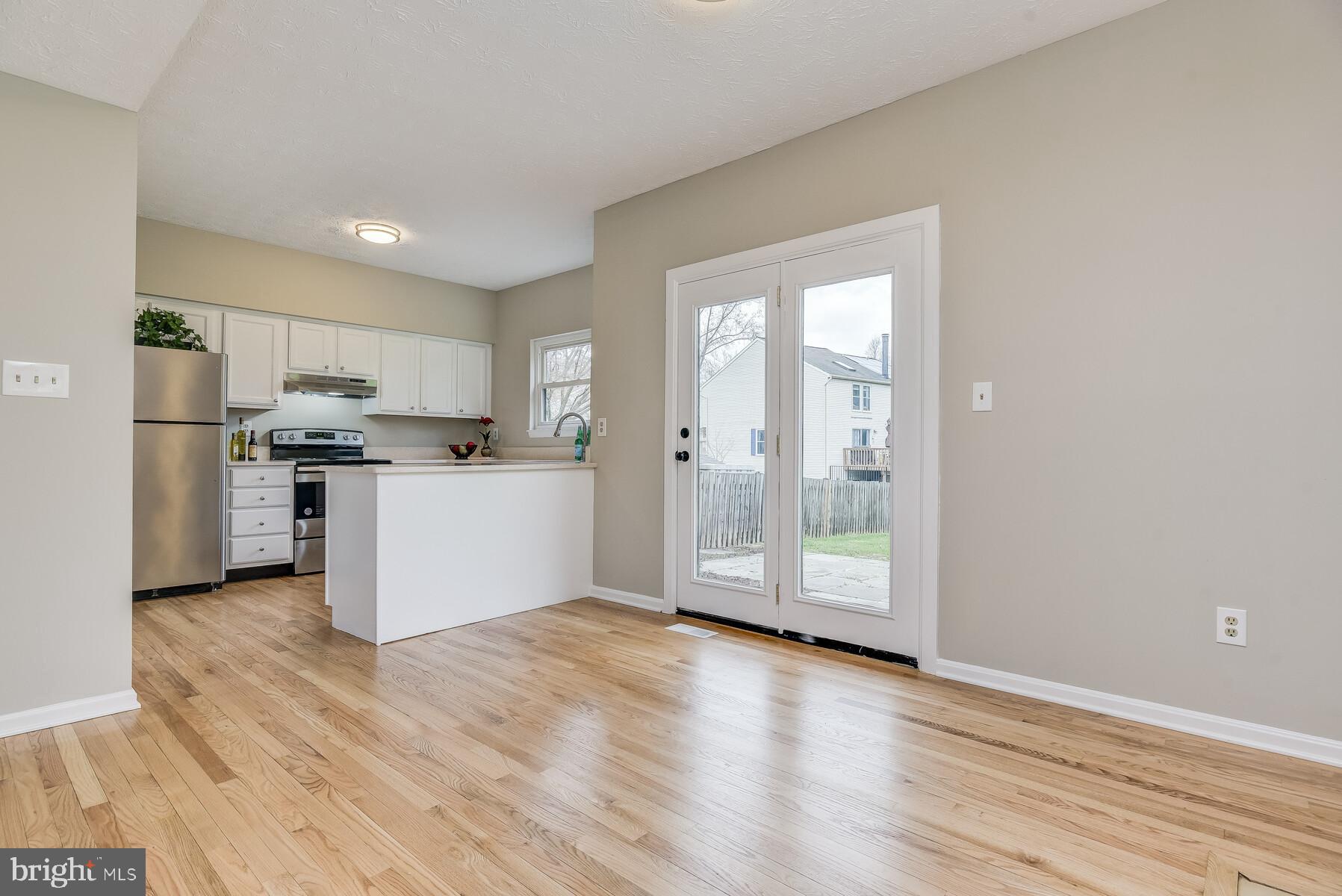 6362 Red Haven Road Columbia, MD 21045 - Photo 19 of 52 French Doors open to stone patio