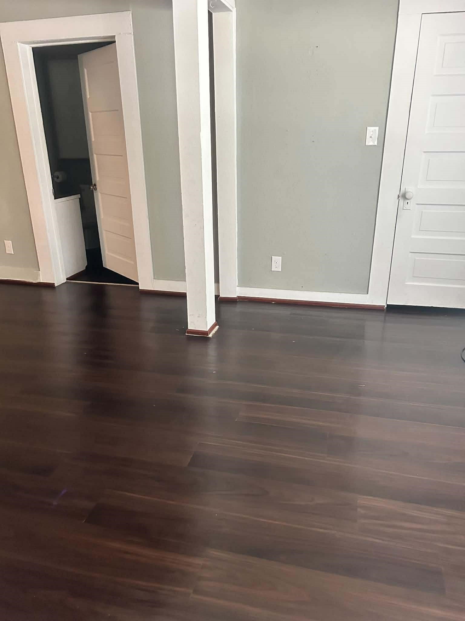 11 Smith Street Shepherd, TX 77371 - Photo 12 of 31 a view of a room with wooden floor and white walls