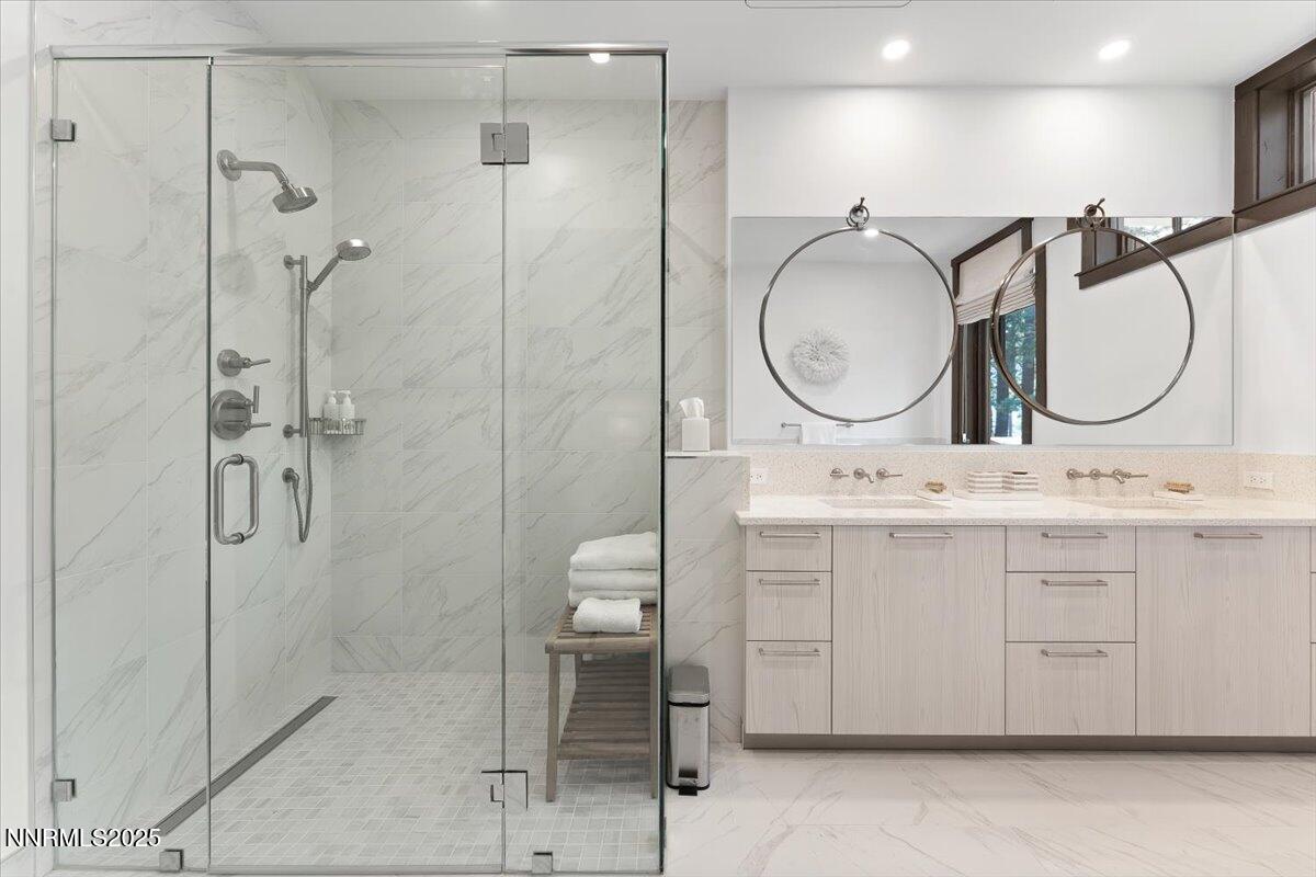 33 Beach Club Drive, Unit 506 Stateline, NV 89449 - Photo 11 of 44 a bathroom with a double vanity sink mirror and toilet