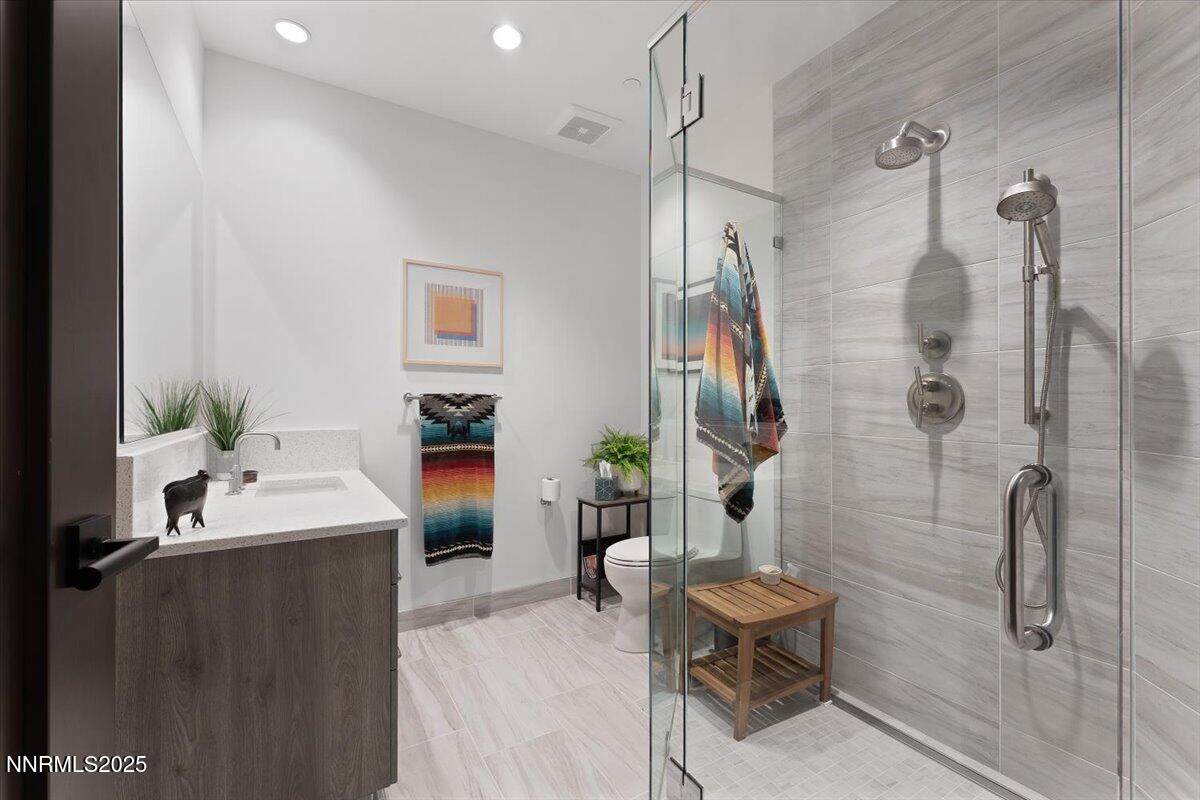33 Beach Club Drive, Unit 506 Stateline, NV 89449 - Photo 13 of 44 a bathroom with a sink toilet and shower