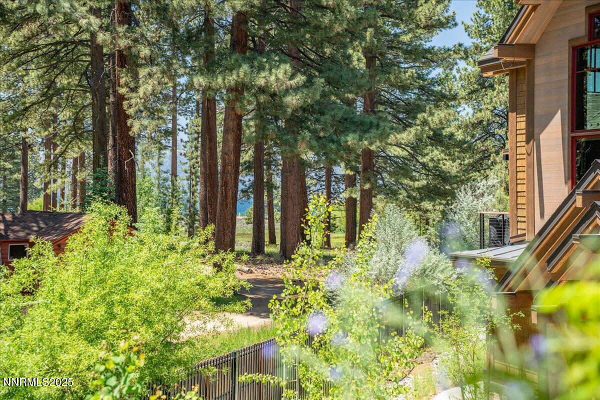 33 Beach Club Drive, Unit 506 Stateline, NV 89449 - Photo 16 of 44 a backyard of a house with lots of green space