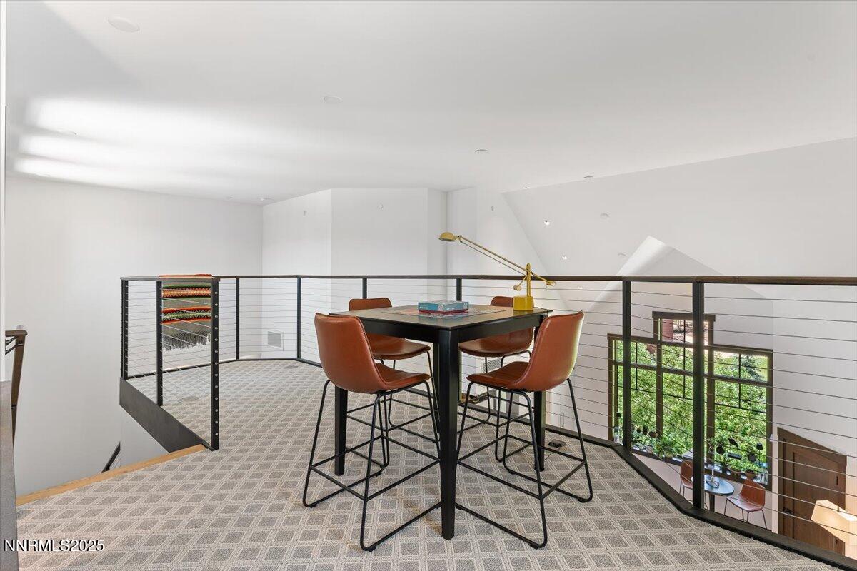 33 Beach Club Drive, Unit 506 Stateline, NV 89449 - Photo 17 of 44 a view of a chairs and table in the balcony