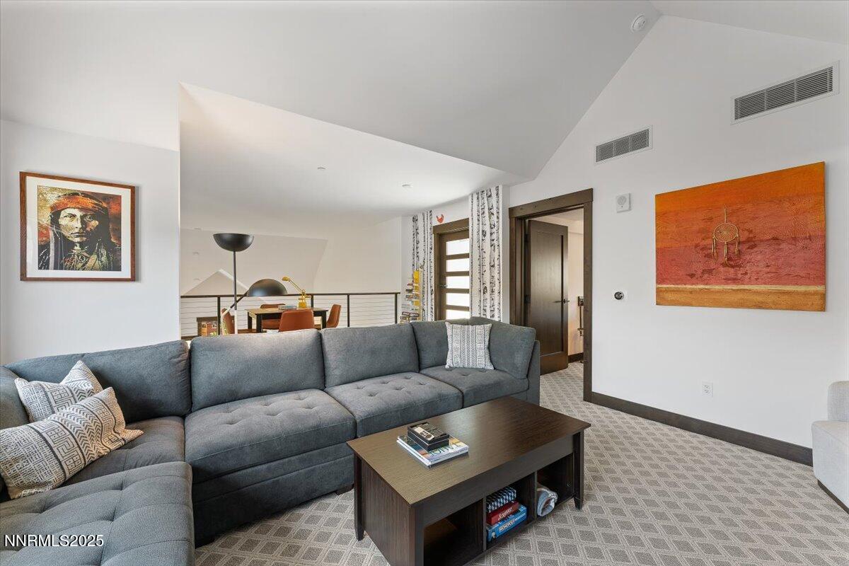 33 Beach Club Drive, Unit 506 Stateline, NV 89449 - Photo 20 of 44 a living room with furniture and a rug