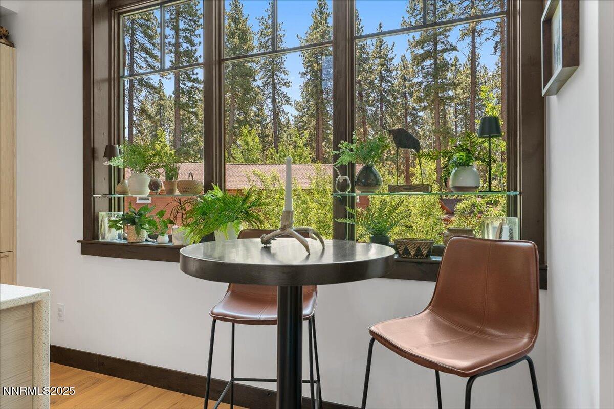33 Beach Club Drive, Unit 506 Stateline, NV 89449 - Photo 4 of 44 a view of a dining room with furniture window and outside view