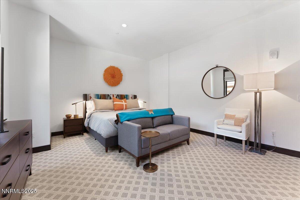 33 Beach Club Drive, Unit 506 Stateline, NV 89449 - Photo 6 of 44 a living room with furniture and a mirror