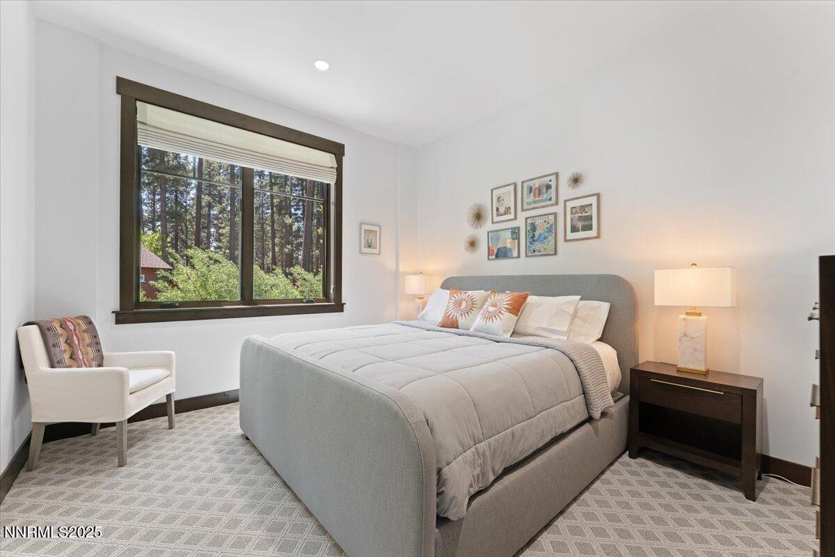 33 Beach Club Drive, Unit 506 Stateline, NV 89449 - Photo 10 of 44 a bedroom with a bed and a large window