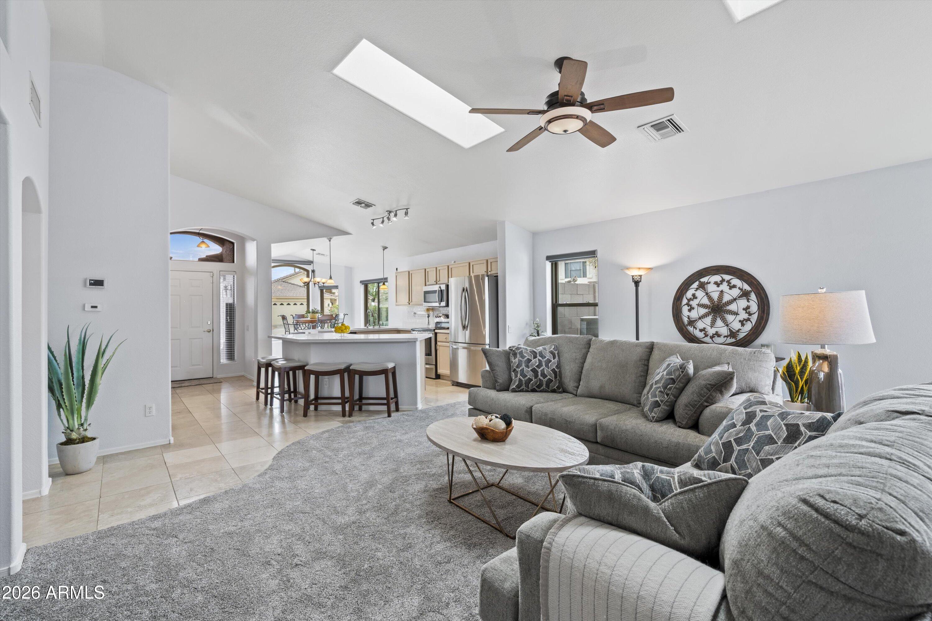 3022 East Captain Dreyfus Avenue Phoenix, AZ 85032 - Photo 5 of 28 09-Living Room to Kitchen