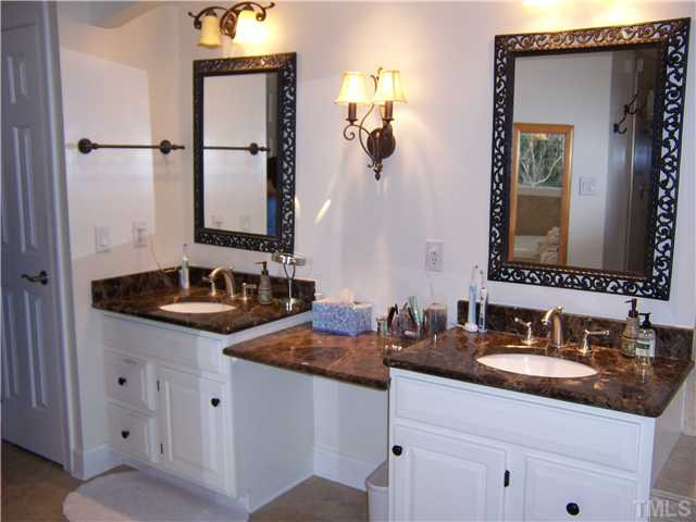 8005 Tanjier Bay Raleigh, NC 27613 - Photo 11 of 25 Updated master bath with granite counters and brushed chrome fixtures Master Bath/Spa
