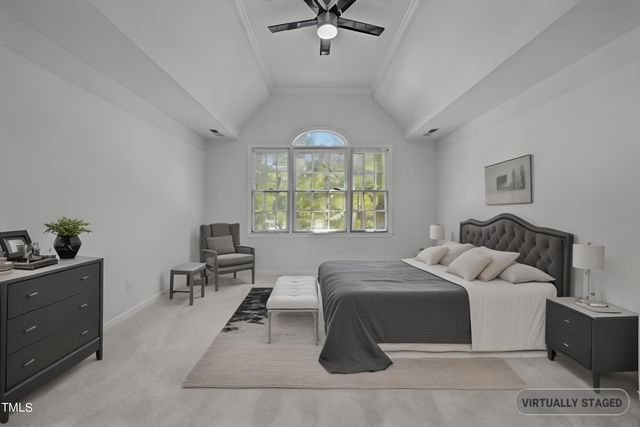a spacious bathroom with a tub sink and mirror